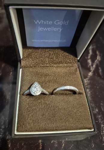 Wedding and engagement ring - and,